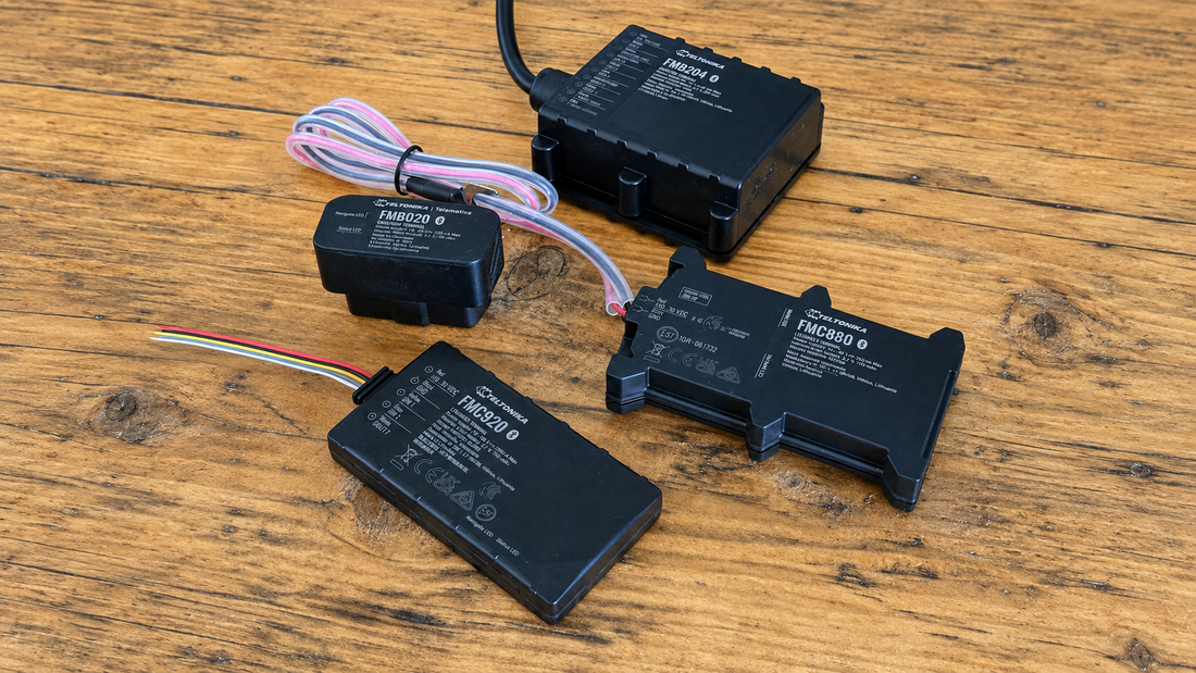 Global Trackers GTOBD, GT1, GT2 and GT3 GPS vehicle trackers on a workbench
